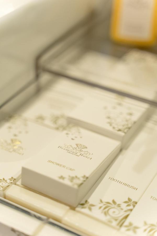 Hotel Diamond Prishtina Laplje Selo Luaran gambar A gold-embossed invitation